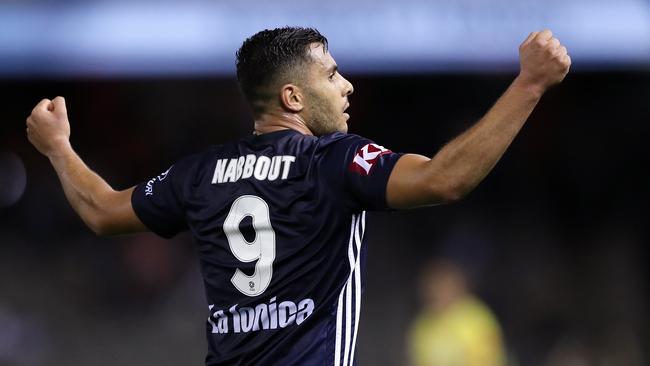 Andrew Nabbout celebrates a big win for the Victory. Photo: AAP Image/George Salpigtidis