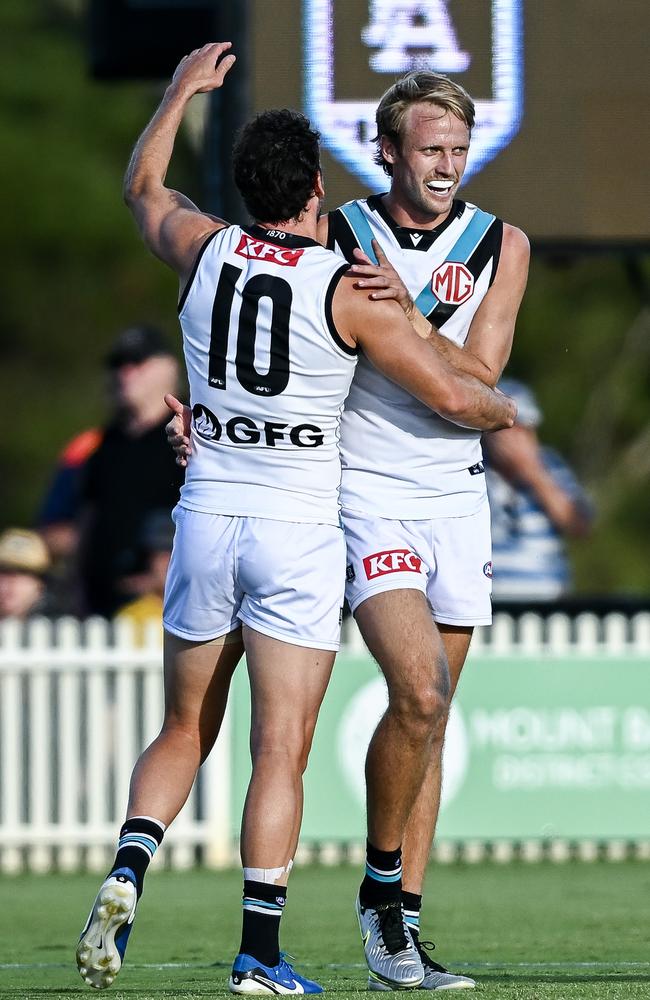 Jack Lukosius celebrates with Travis Boak. Picture: Mark Brake/Getty Images