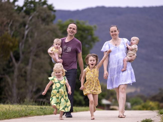 Sara Knight and Trent Furnari, aged 36 and 46, moved to Wodonga from Melbourne in 2018 to raise a family in Tangambalanga, near Albury. Sara and Trent with their kids Annabelle, 3, Elva, 5, and twins Sebastian and Patrick [11 months].   Picture: Alex Coppel