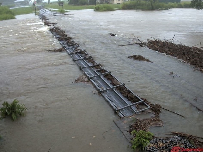 Water has flowed over rail tracks in Far North Queensland, causing disruptions to train services across the region.