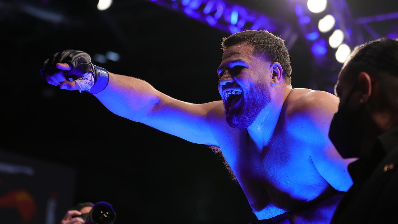 Tuivasa roars in delight after winning his fourth fight on the bounce. Picture: Carmen Mandato/Getty Images