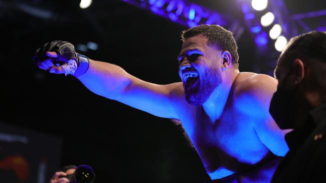 Tuivasa roars in delight after winning his fourth fight on the bounce. Picture: Carmen Mandato/Getty Images