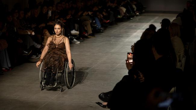 A wheelchair-bound model on the runway during the Nadya Dzyak show. Picture: Getty Images.