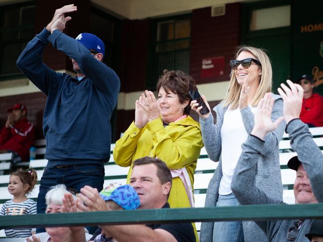 Candice Falzon applauds her husband David Warner as he reaches 100 on Saturday. Picture: Luke Drew