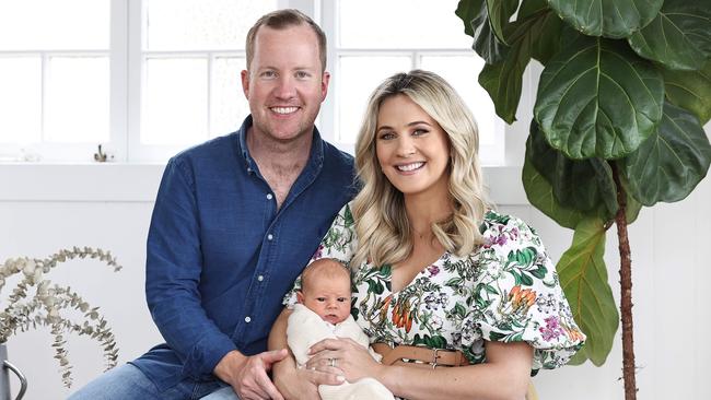 Kendall at home with husband Tim Morgan and one-week-old Moses. Picture: Tara Croser