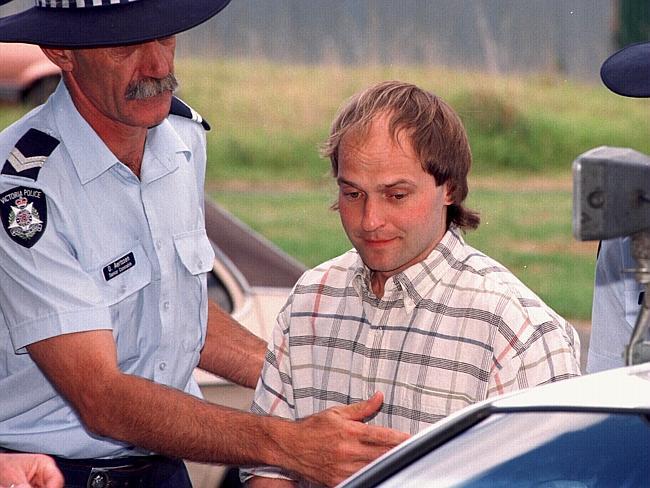 Domaszewicz being escorted into Moe Magistrates Court during a committal hearing.  