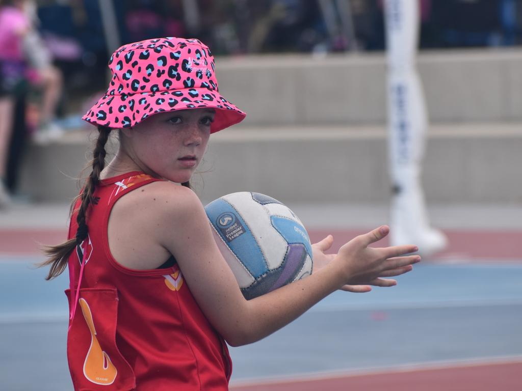 On court at the Cap Coast Junior Netball Carnival at the Barmaryee Multi Sports Precinct, Yeppoon, on August 11, 2024. Photo: Pam McKay