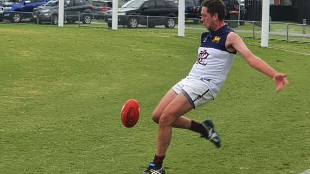 Carrum Patterson Lakes player, a returning junior, Jack Thompson takes a kick in the Third match. Pic: CPL