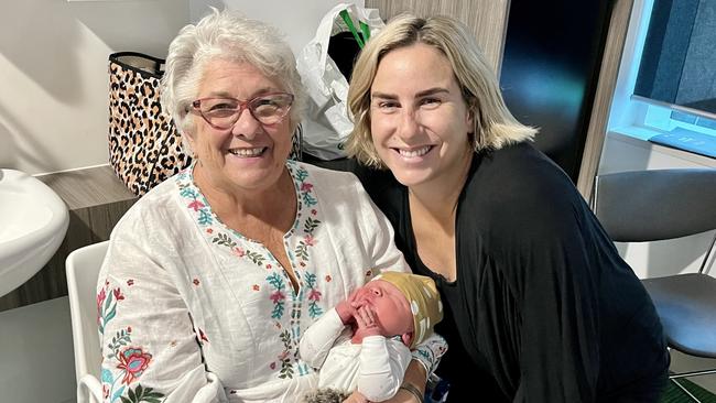 Gail McCombe holding newborn Jock with Caitlin McCombe.