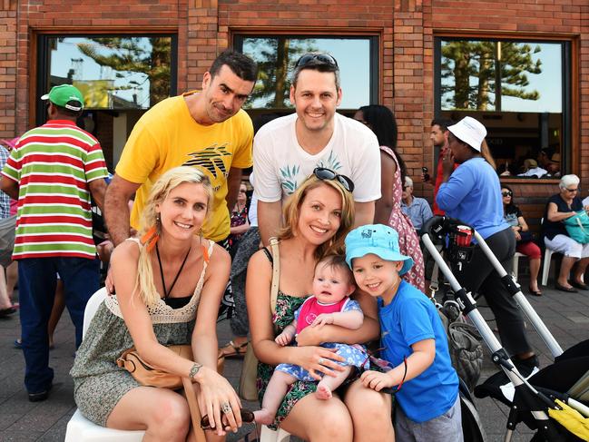 Emily Mobey and Michelle Dunn, holding baby Avery Dunn, with her son Callen Dunn with Sannon Mobey and Brett Dunn at the Manly Jazz festival in 2014. Picture: Virginia Young