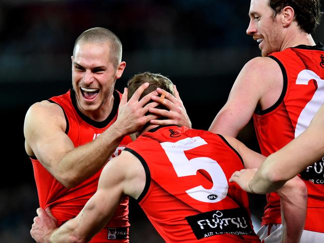 David Zaharakis of the Bombers celebrates a goal during the Round 23 AFL match between the Port Adelaide Power and the Essendon Bombers at Adelaide Oval in Adelaide, Friday, August 24, 2018. (AAP Image/Kelly Barnes) NO ARCHIVING, EDITORIAL USE ONLY