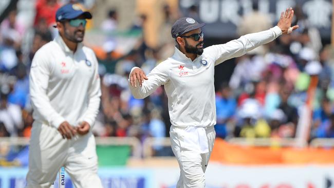 India captain Virat Kohli moves his fielders during the final day at Ranchi.