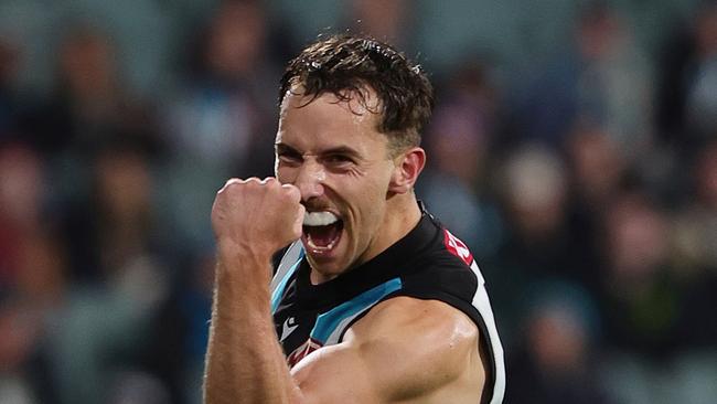 ADELAIDE, AUSTRALIA - JULY 20: Francis Evans of the Power celebrates a goal during the 2024 AFL Round 19 match between the Port Adelaide Power and the Richmond Tigers at Adelaide Oval on July 20, 2024 in Adelaide, Australia. (Photo by Sarah Reed/AFL Photos via Getty Images)