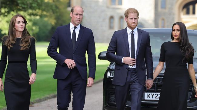 Catherine, Princess of Wales, Prince William, Prince of Wales, Prince Harry, Duke of Sussex, and Meghan, Duchess of Sussex on their way to view tributes to Queen Elizabeth in September. Picture: Getty