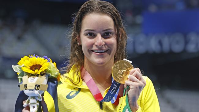 Kaylee McKeown claims her gold medal in the women’s 100m backstroke. Picture: Alex Coppel