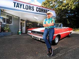 RETRO SPECTACULAR: Steve Bowman with his muscle car outside Taylors Corner service station in Murwillumbah. Picture: Scott Powick