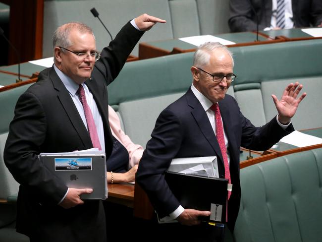 Treasurer Scott Morrison shows his support for Malcolm Turnbull as they both enter the chamber for Question Time today in the House of Representatives, Federal Parliament, Canberra.