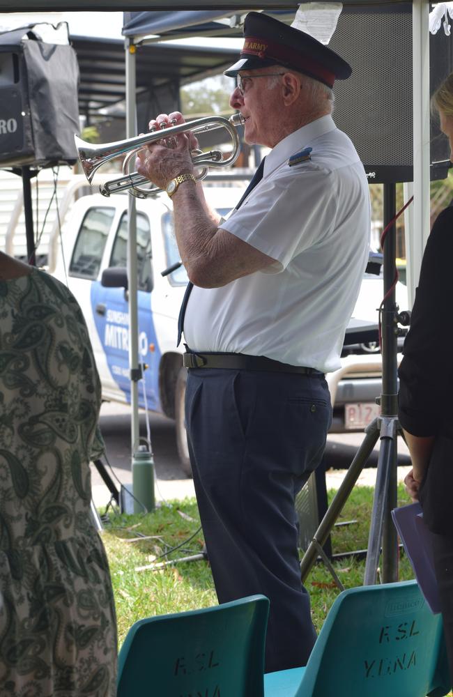 A bugler of 40 years playing The Last Post at Yandina.