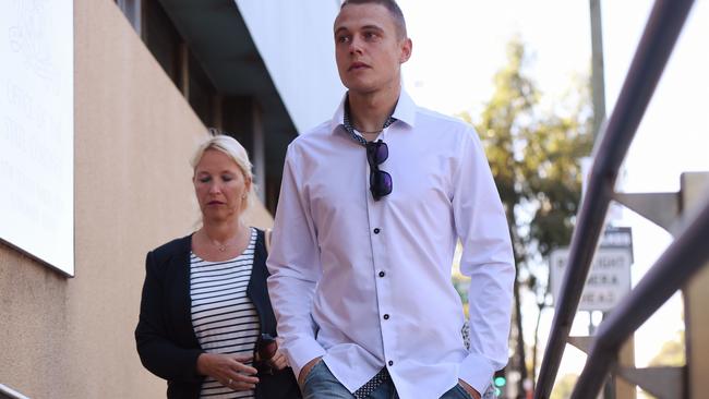 Tim Lauschet (right), the son of MH17 victim Gabriele Lauschet attended a coronial hearing in Sydney that heard his mother was a victim of “mass murder”. Picture: AAP/Dean Lewins