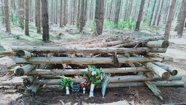 Flowers placed where Dr Yen-Yung Yap was found in Kuitpo Forest.