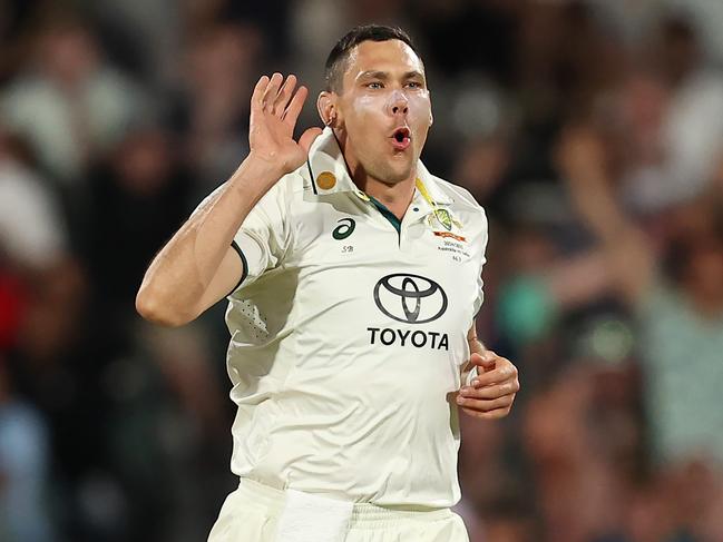 ADELAIDE, AUSTRALIA - DECEMBER 07: Scott Boland of Australia reacts after a delivery during day two of the Men's Test Match series between Australia and India at Adelaide Oval on December 07, 2024 in Adelaide, Australia. (Photo by Paul Kane/Getty Images)