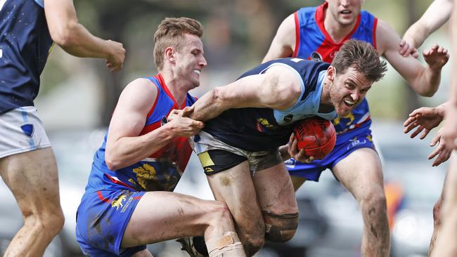 Lindisfarne's Kieren Rogers is tackled by Huonville's Rhys Ward. Picture: Zak Simmonds