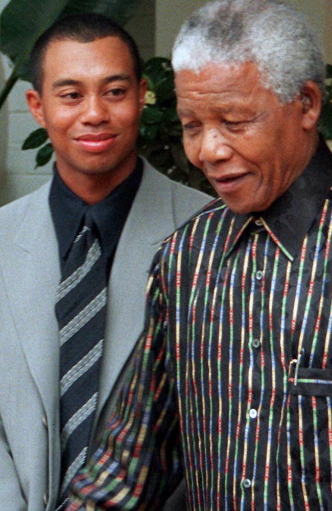 Tiger Woods meets with South African president Nelson Mandela.