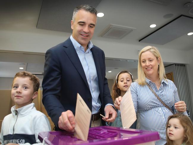 SA Premier Peter Malinauskas and family casting their ballots for a Voice to federal parliament in Brompton. Picture: Dean Martin