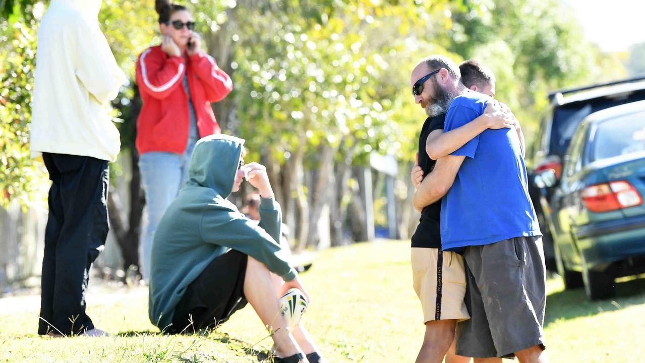 Benjamin Hunter’s teammates and friends gathered at the crash site on Image Flat Rd, near Nambour, to grieve. Picture: Patrick Woods.