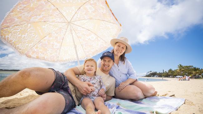 Dave and Jess Moloney from Rockhampton on holiday at Cotton Tree on the Sunshine Coast with their one-year-old daughter Grace. Picture: Lachie Millard