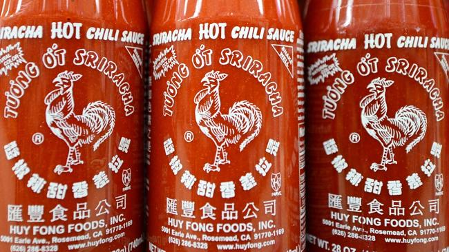 Rooster sauce: Still reigns on supermarket shelves. AFP PHOTO/Frederic J. BROWN