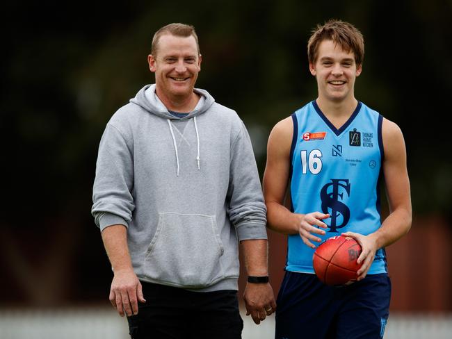 Father-son prospect Casey Voss with his dad, Brisbane Lions great and Port assistant coach Michael Voss at Unley Oval earlier this year. Picture: Matt Turner.