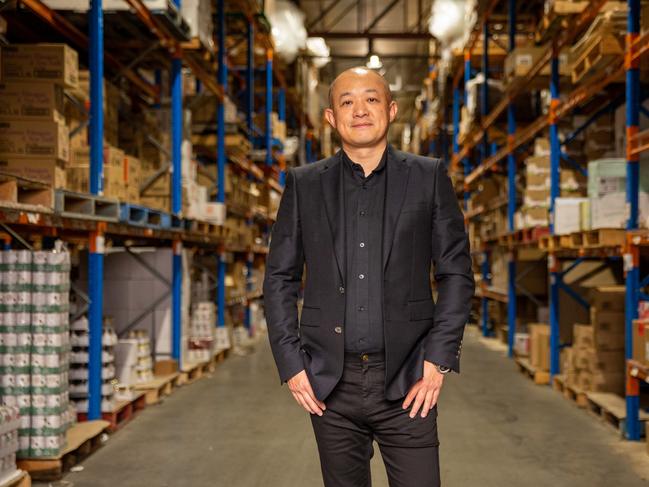 Founder Sam Shan pictured.  eBest Australia launches English language food delivery service., , Pics of staff and product. plus pics of owner Sam Shan at the company's Chullora warehouse space.