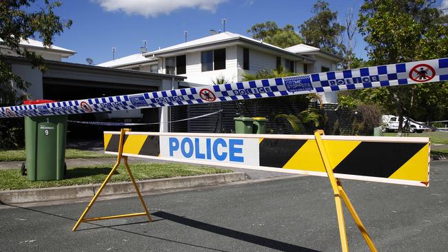 Police and Queensland Fire and Emergency Services investigate at a home in Coomera after emergency services were called to a house fire and a manÃ&#149;s body was found inside. Picture: Tertius Pickard