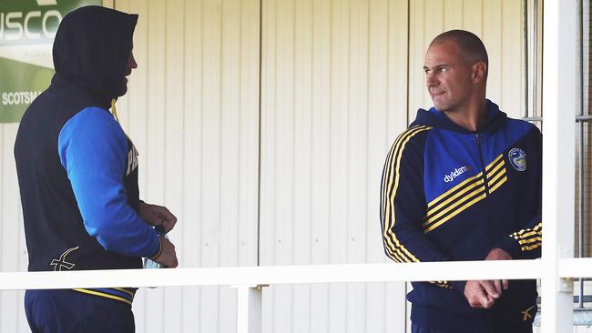 Eels coach Brad Arthur talks to Anthony Watmough — whose retirement could save the season.