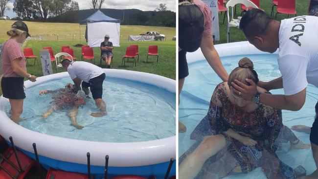 A woman being "baptised" in a blow-up pool at the Summer of Love festival at the weekend in Albion Park. Picture: Facebook.