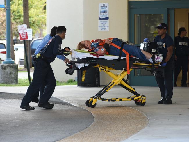 A shooting victim is taken into Broward Health Trauma Center in Fort Lauderdale. Picture: Taimy Alvarez /South Florida Sun-Sentinel via AP