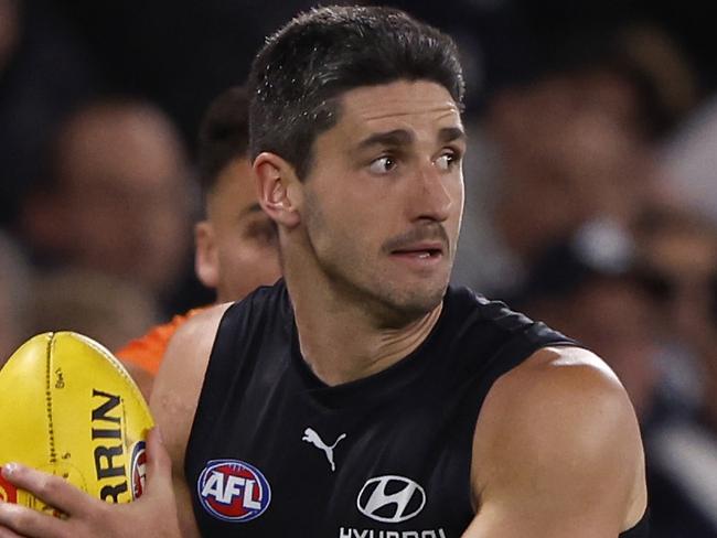 MELBOURNE, AUSTRALIA - APRIL 20:  Marc Pittonet of the Blues runs with the ball during the round six AFL match between Carlton Blues and Greater Western Sydney Giants at Marvel Stadium, on April 20, 2024, in Melbourne, Australia. (Photo by Darrian Traynor/Getty Images)