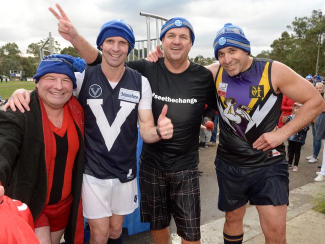 Matt Breen, Phil Murton, Stuart Greig, and Mark Etherington are all smiles after being dunked in the Fight MND bucket. Picture: Steve Tanner