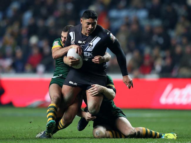 Jason Taumalolo is brought down by the Australian defence during the Four Nations.