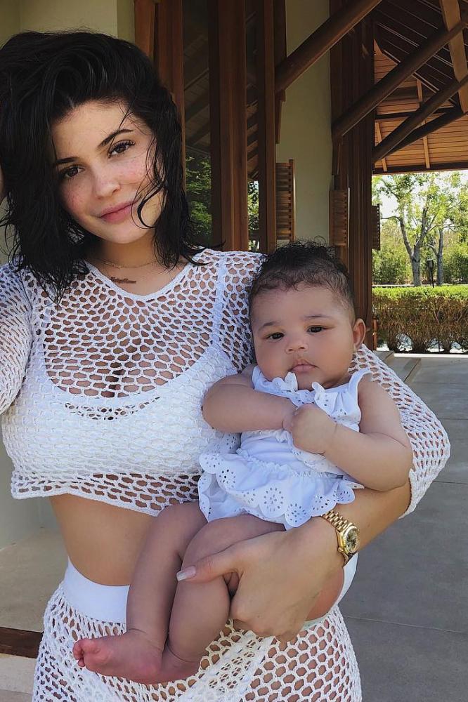 Kylie Jenner Holds Stormi in $625 Gucci Baby Carrier - Kylie Jenner's Gucci  Baby Carrier