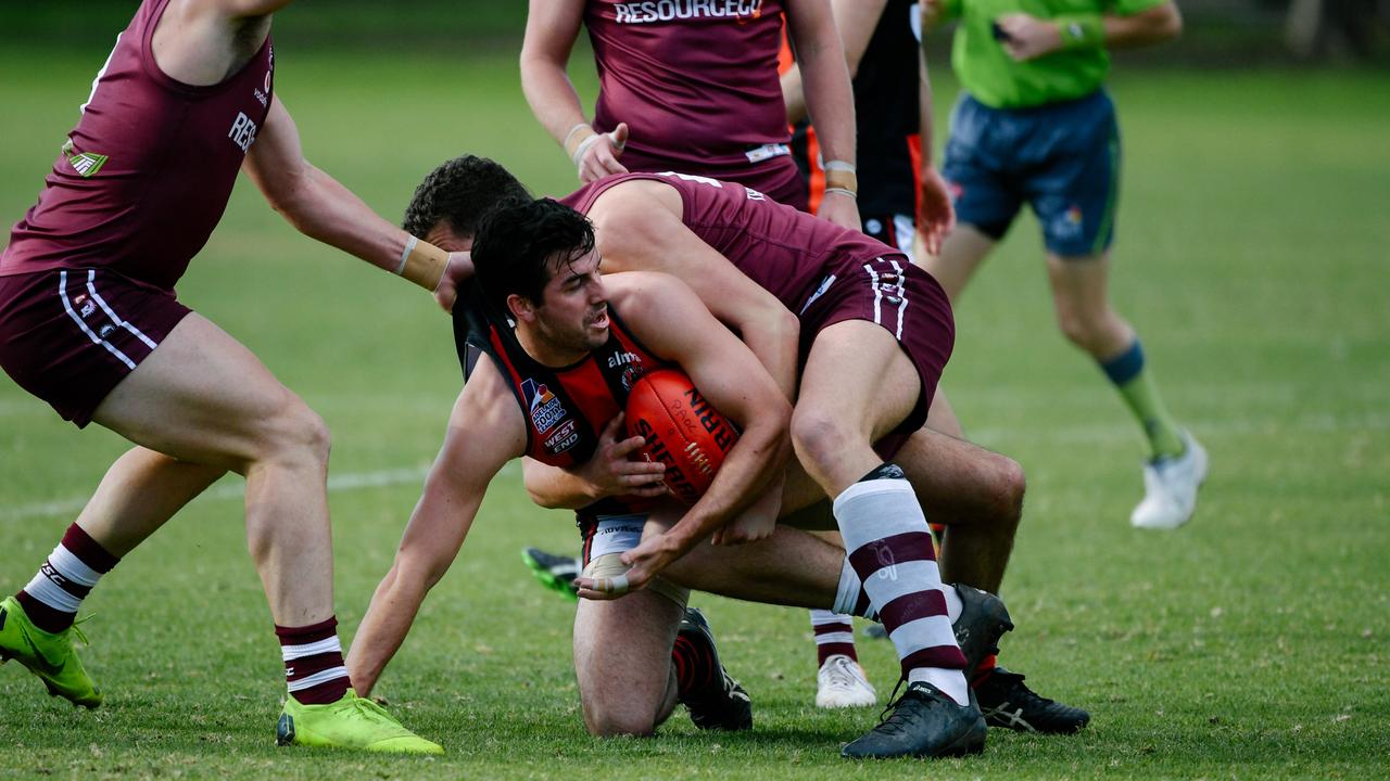 Kieran Holland with the ball on the ground during the Adelaide Footy League match between Prince Alfred Old Collegians and Rostrevor Old Collegians on Saturday, June 22, 2019. (AAP Image/ Morgan Sette)