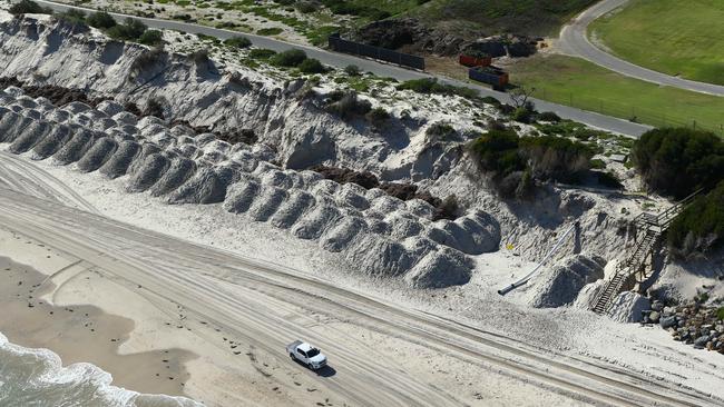 An aerial view of West Beach in 2015, near the Adelaide Shores Caravan Park, with dumped beach sand to replenish the eroded foreshore. Picture: Tait Schmaal.