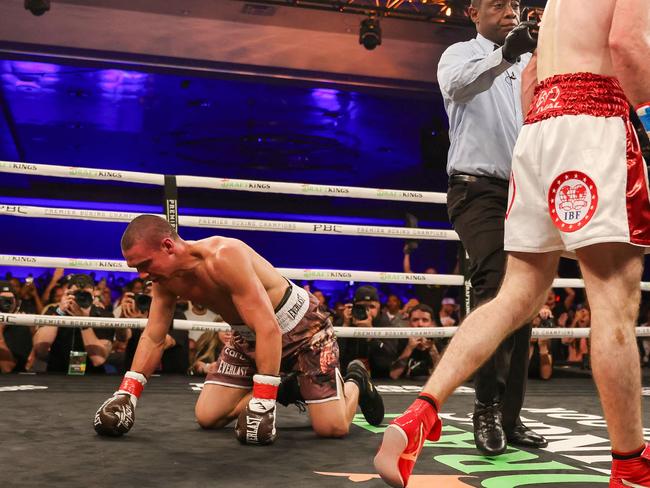 ORLANDO, FLORIDA - OCTOBER 19: Bakhram Murtazaliev walks to the corner after knocking down Tim Tszyu at Caribe Royale Orlando on October 19, 2024 in Orlando, Florida.   Alex Menendez/Getty Images/AFP (Photo by Alex Menendez / GETTY IMAGES NORTH AMERICA / Getty Images via AFP)