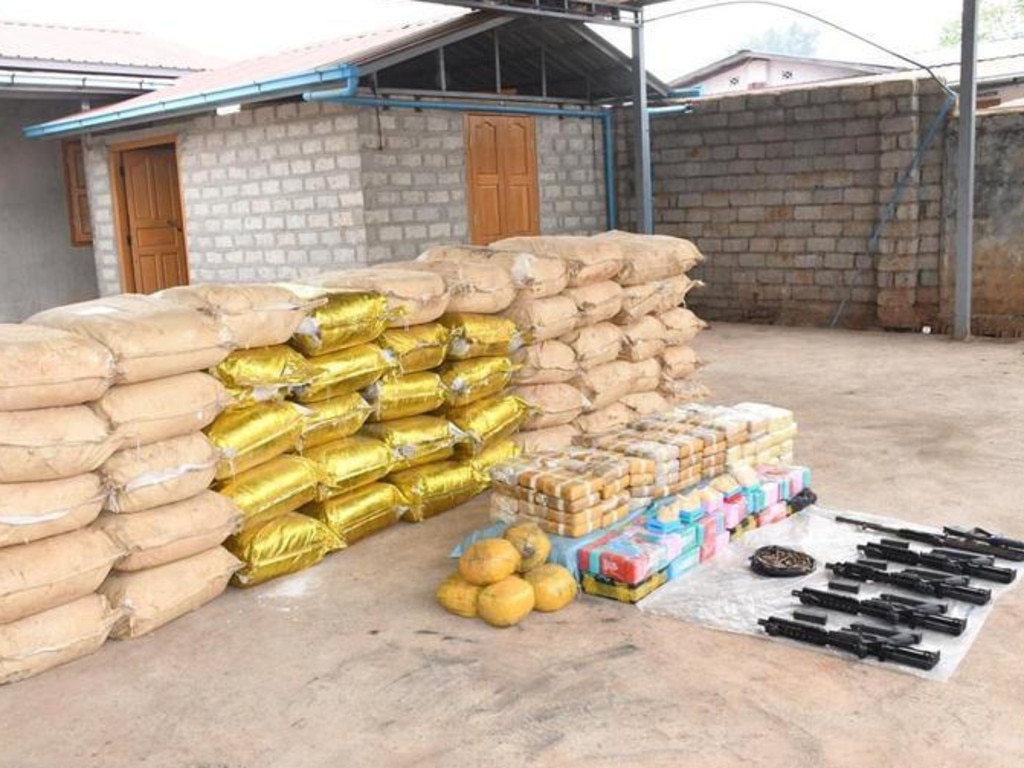 Weapons, ammunition, crystal meth and Yaba pills seized by Myanmar police in Shan State. Picture: Reuters