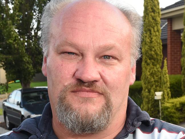 Pakenham resident Giles Gibson with camera, similiar to those installed outside houses in Lakeside Estate, Pakenham. He is behind a project to have the entire estate covered by CCTV camera which feed security vision live back to police. Picture: Chris Eastman