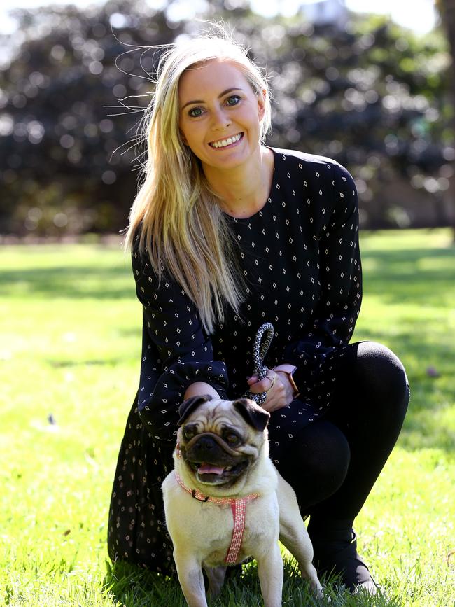 Animal Justice Party MP Emma Hurst pictured with Mia the pug in the Domain. Picture: Toby Zerna