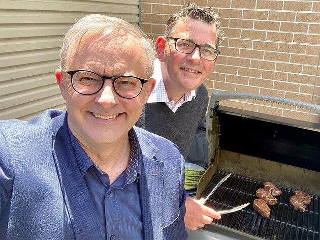 Anthony Albanese and Daniel Andrews enjoying a barbecue together.