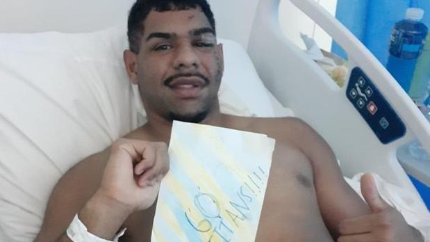 Treymain Spry has been cheering on the Titans from the sidelines after spending time in hospital after he was viciously attacked. Picture: Supplied.