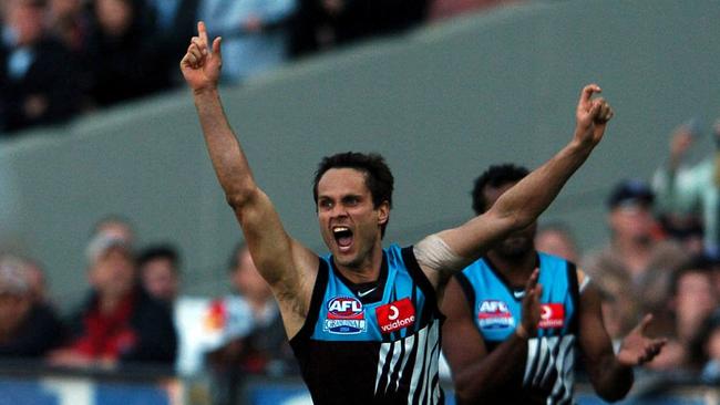 Gavin Wanganeen celebrates the Power’s win in the 2004 AFL Grand Final against Brisbane.